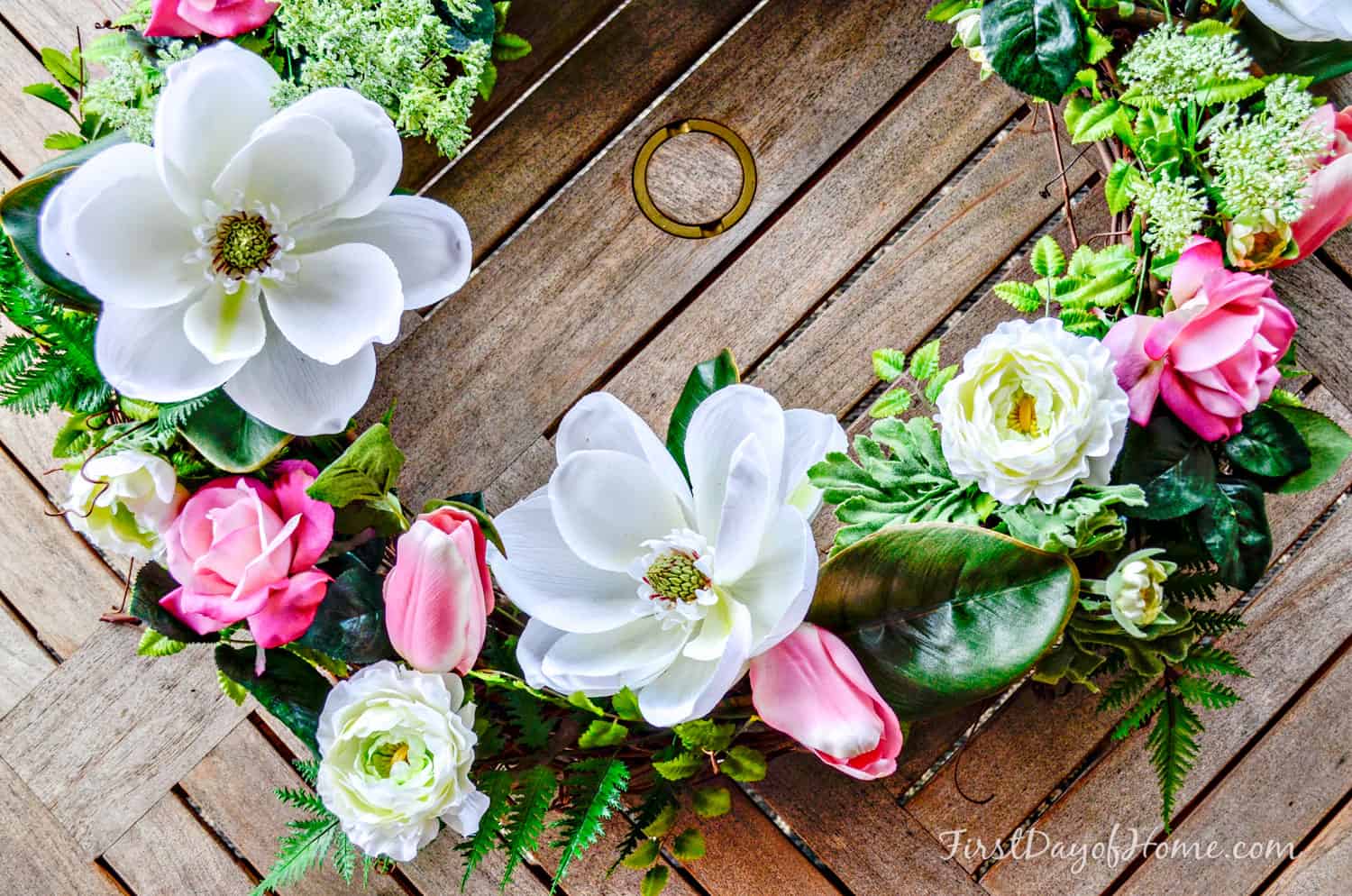 Pink and white florals on grapevine wreath for front door spring wreath