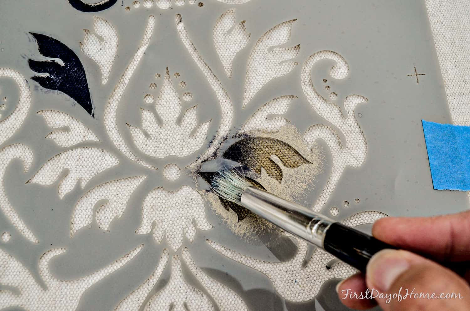 Adding depth to stencil with multiple layers of paint on a drop cloth table runner