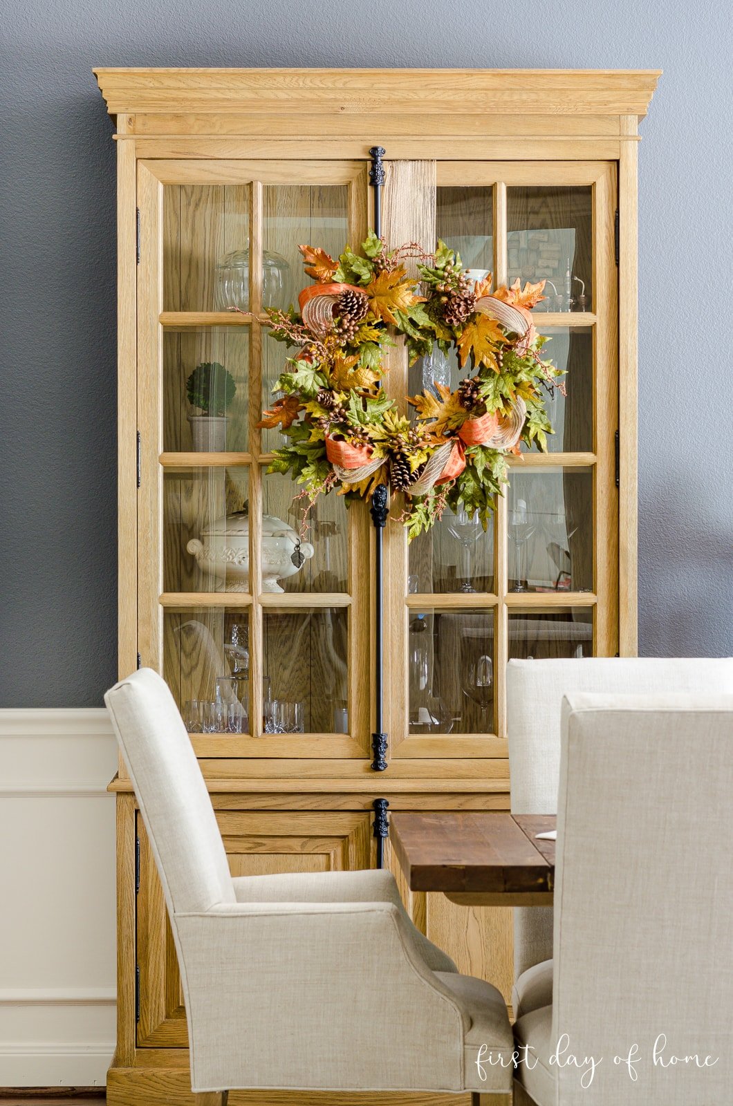 Fall wreath on cabinet in formal dining room