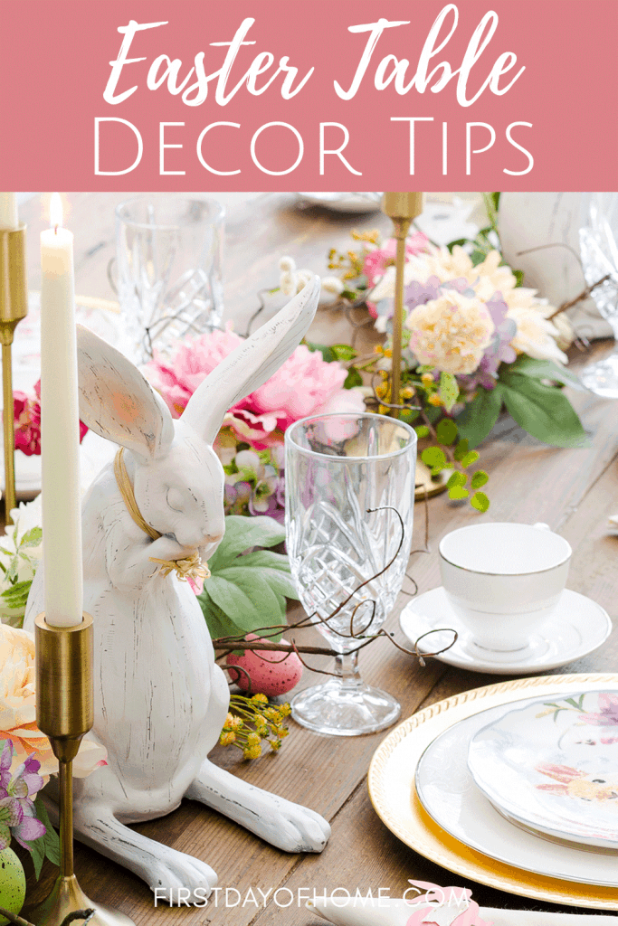 Easter table decorated with florals, bunnies and taper candles