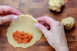 Empanada dough with pumpkin empanada filling
