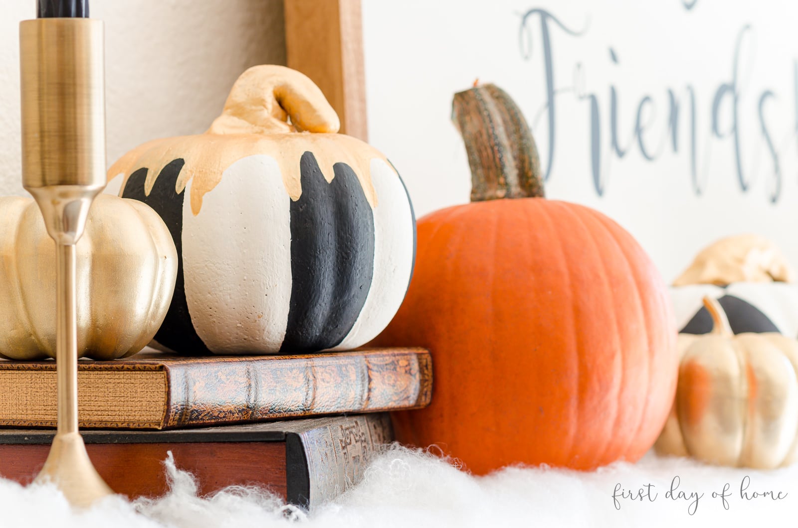 Painted foam pumpkins using black and white chalk paint, acrylic paint and gold leaf