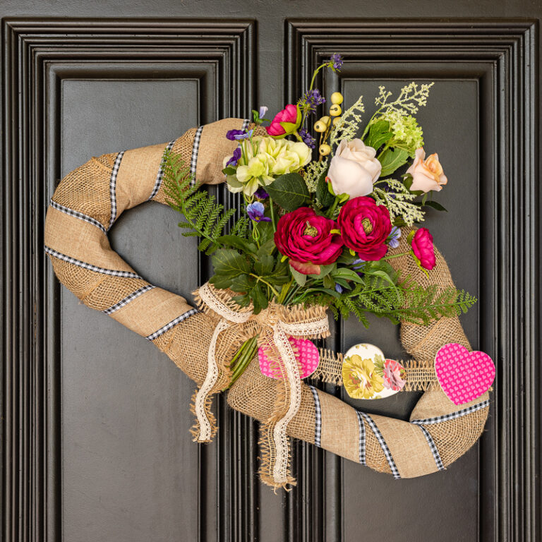 DIY Valentine Wreath with faux flowers and wooden heart banner