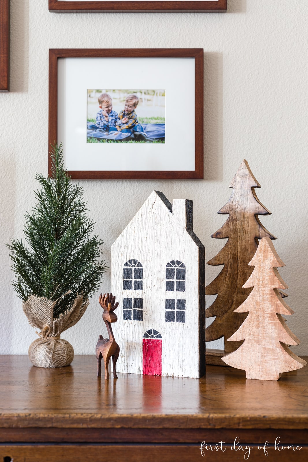Christmas village with wooden houses and wood Christmas trees