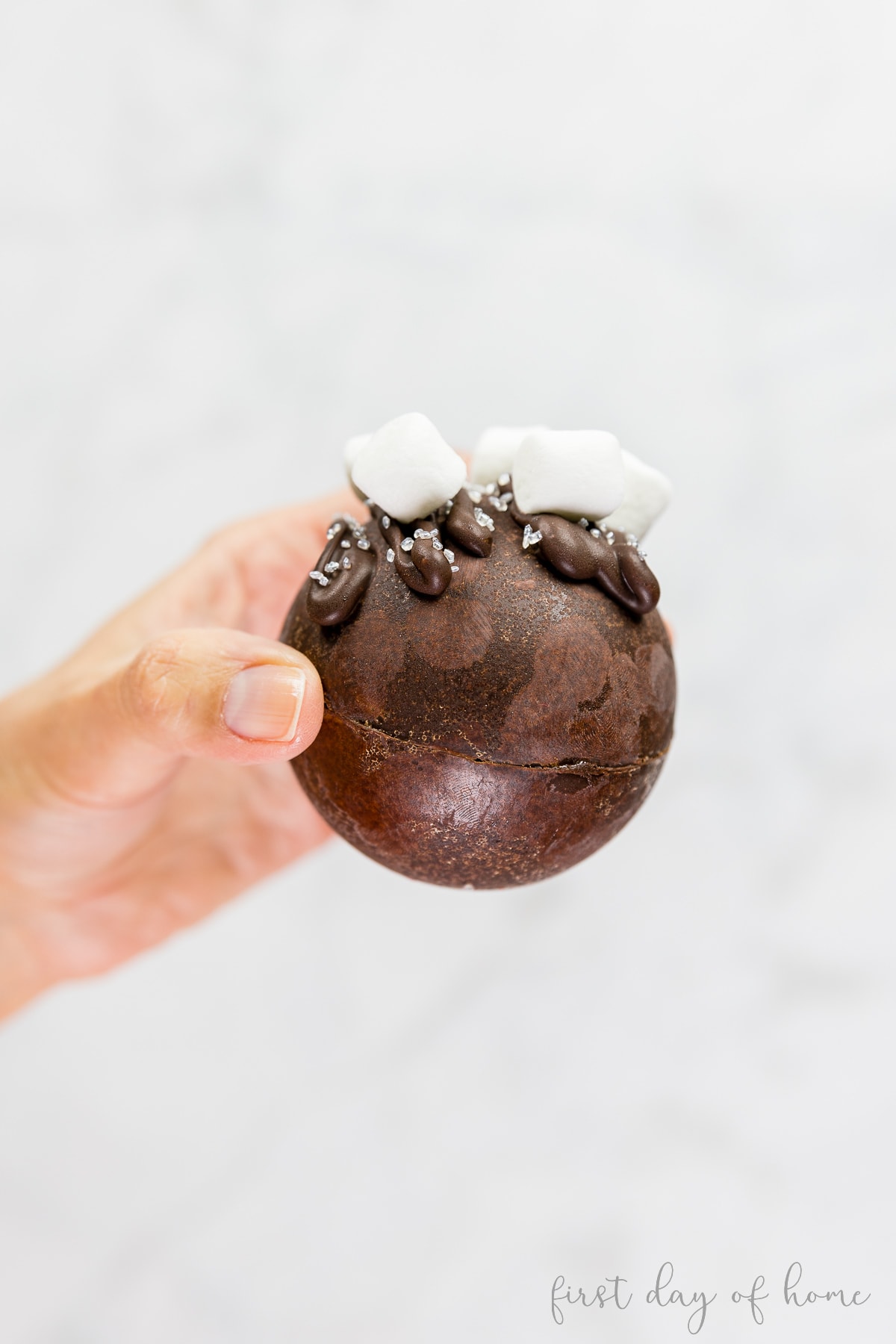 Hot chocolate bomb with bloom imperfections
