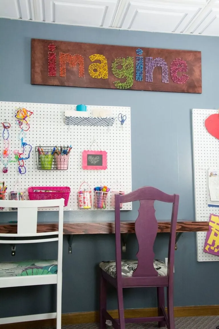 Kids craft room ideas including DIY desk, painted chair and string art craft room decor
