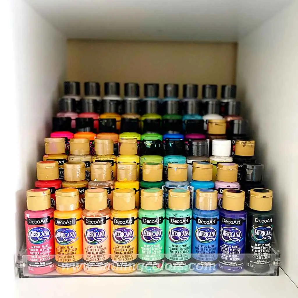 Paint storage using spice rack risers