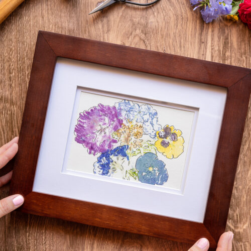 Framed flower pounded art made with fresh flowers and hammer
