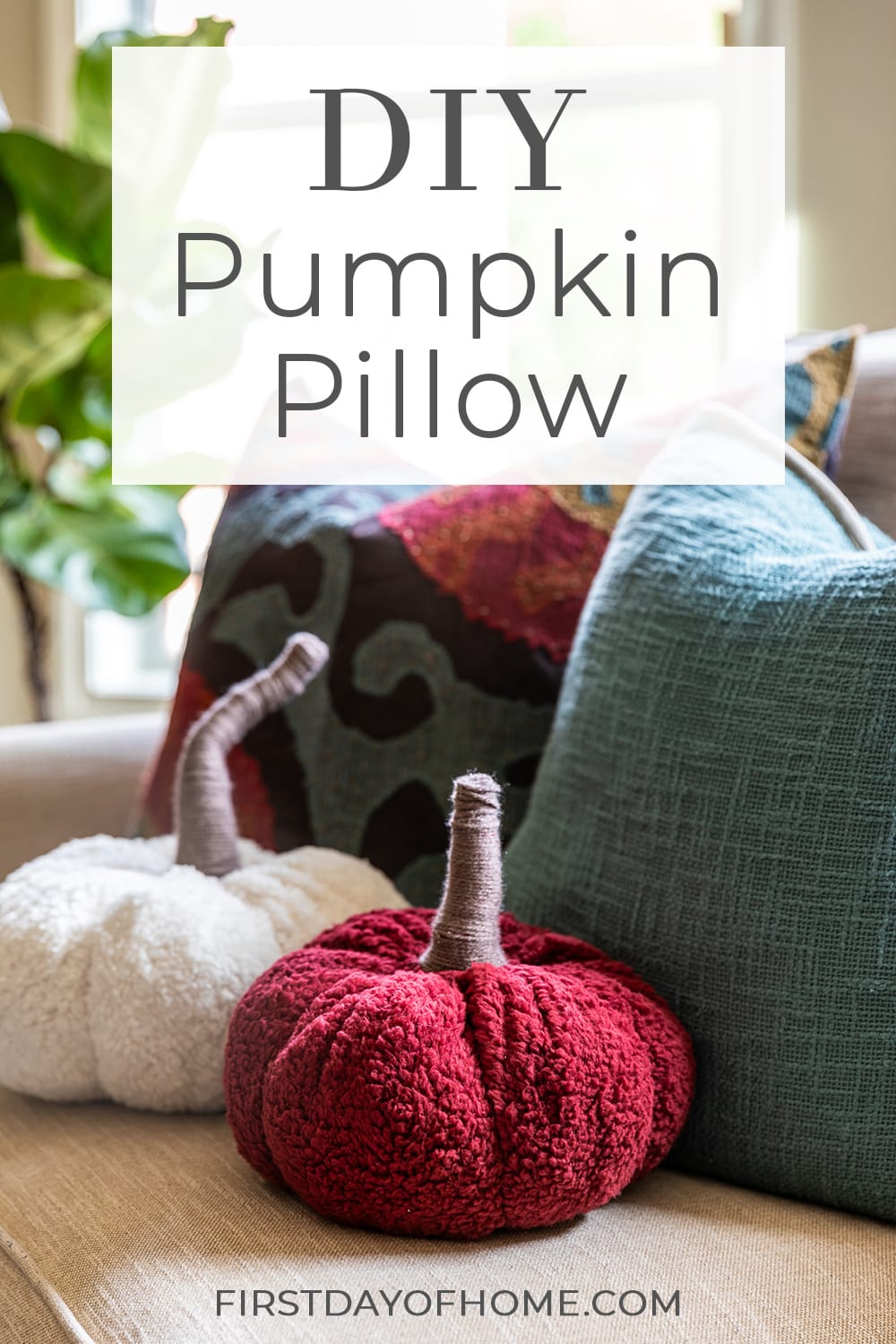 Pair of sherpa pumpkin pillows on sofa with throw pillows. Text overlay reads "DIY Pumpkin Pillow".