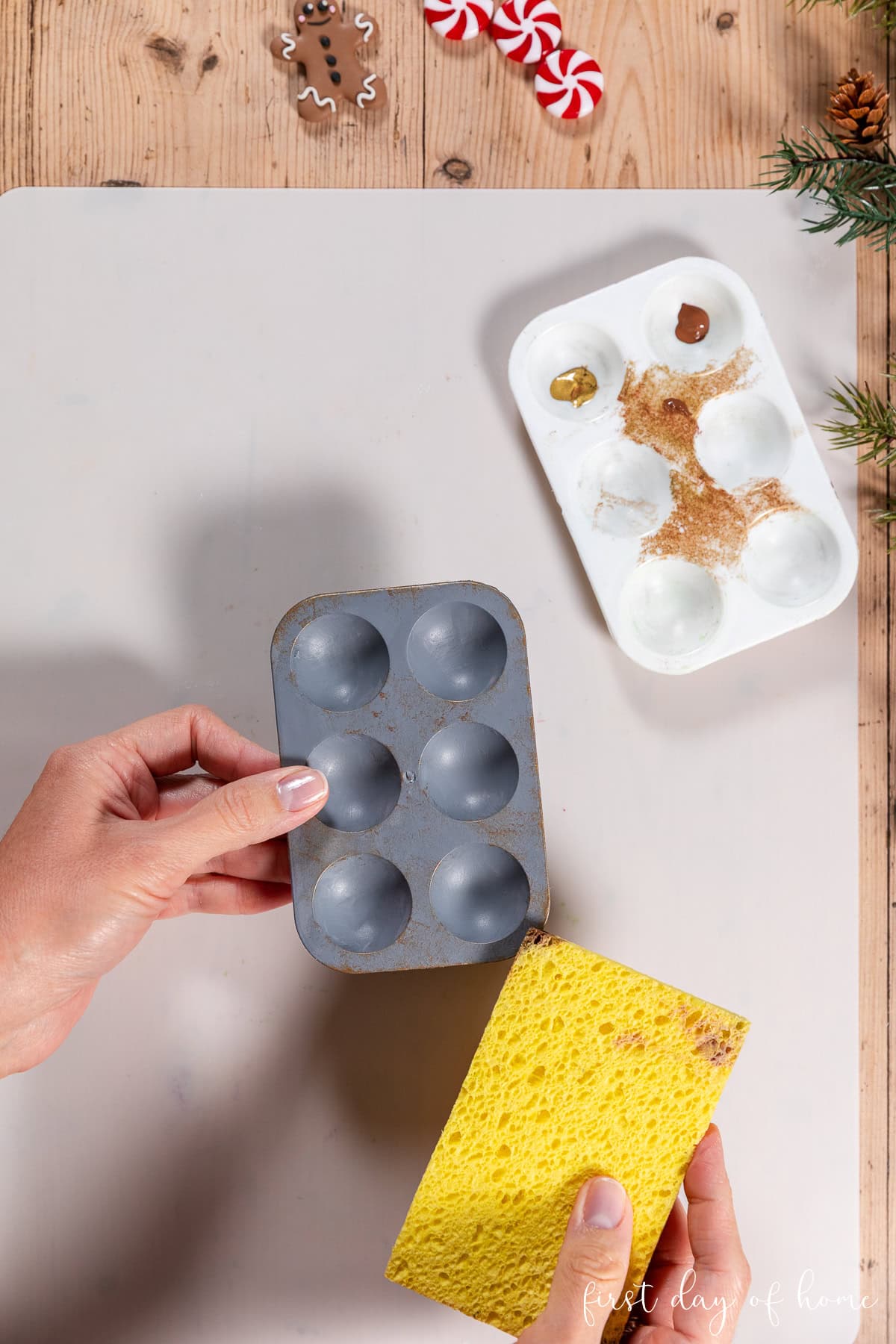 Adding distressed details to a tray painted to look like a muffin tin.