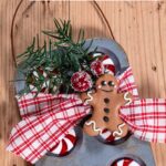 Mini muffin tin ornaments with a gingerbread man.