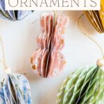 Paper Easter ornaments in the shapes of bunnies, carrots, and Easter eggs.