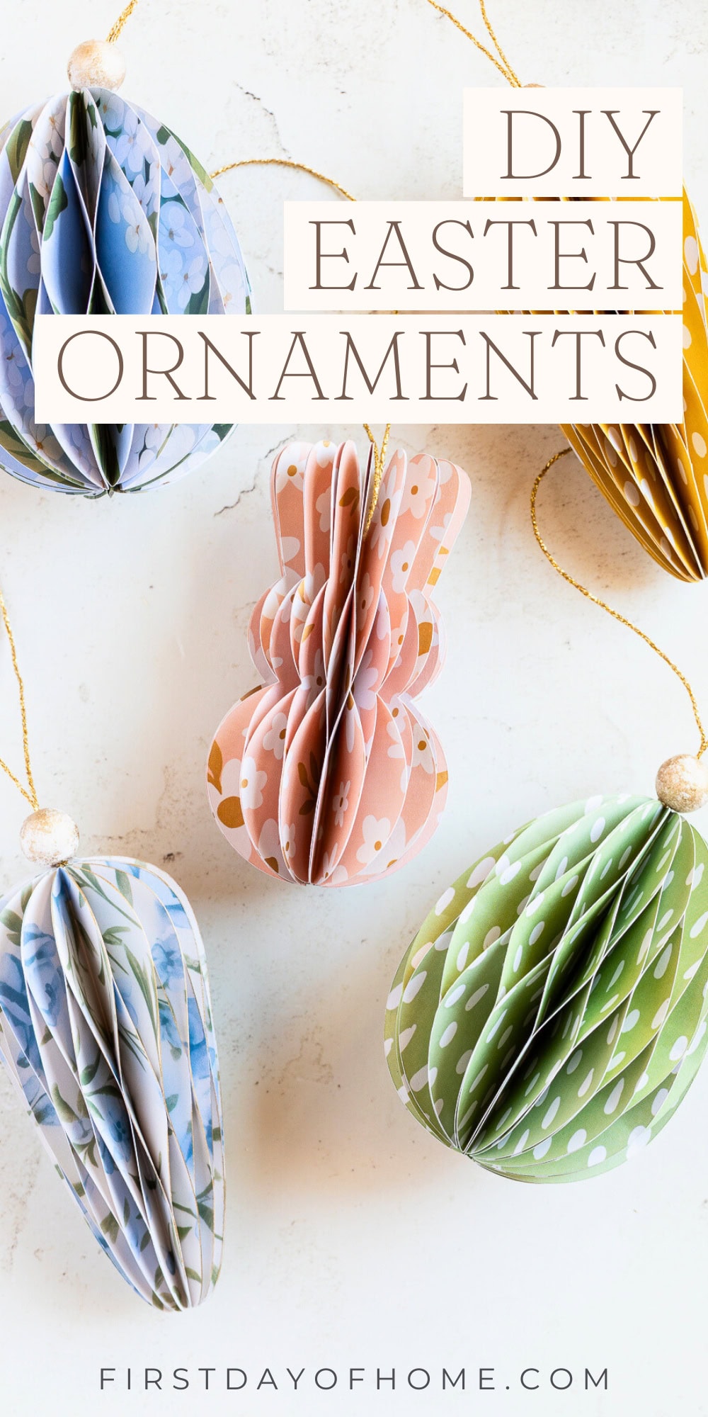 Paper Easter ornaments in the shapes of bunnies, carrots, and Easter eggs.