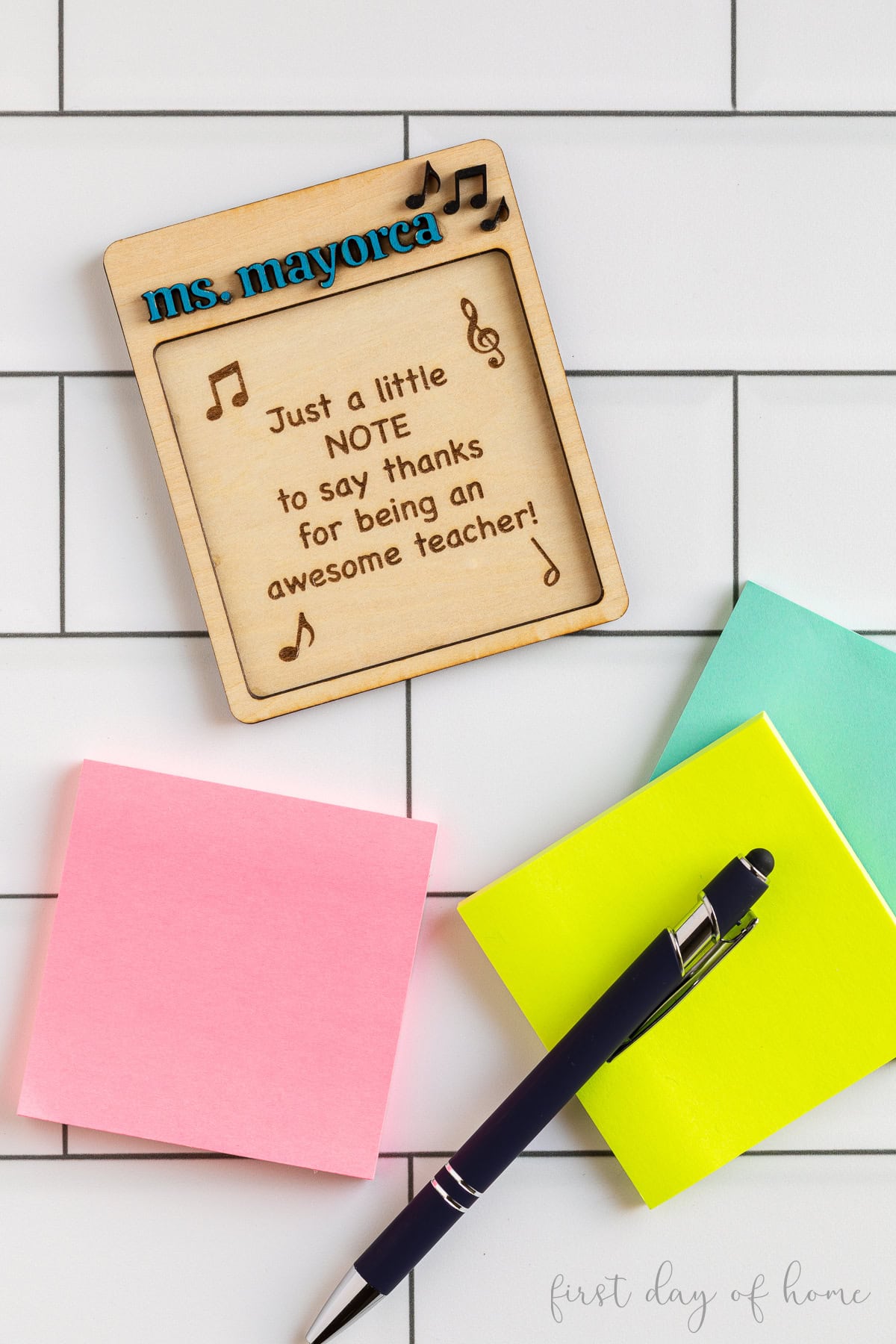 Laser engraved wooden teacher post-it note holder that reads "Just a note to say thanks for being an awesome teacher."