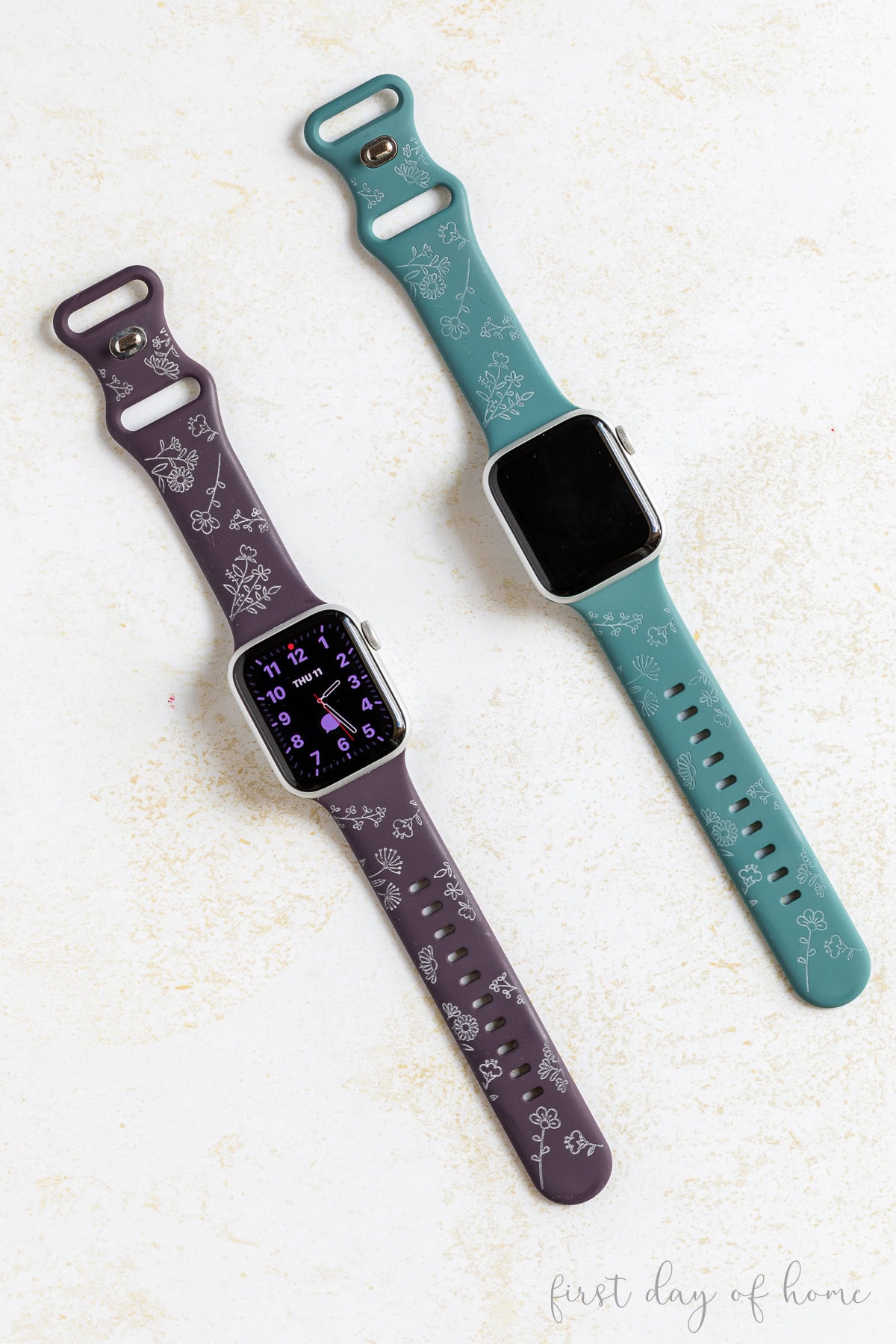 Two Apple watch bands engraved with a laser machine.