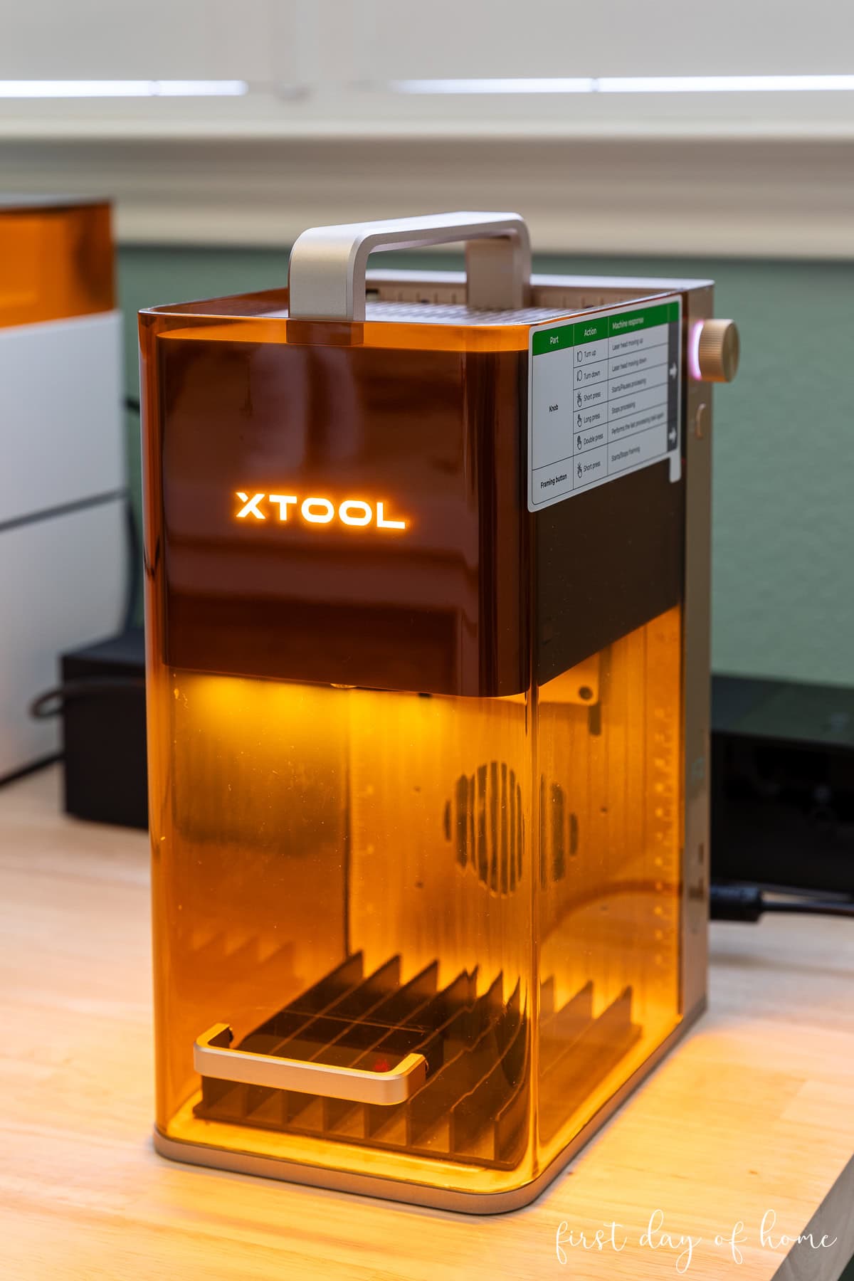 xTool F2 dual portable laser sitting on a desk.