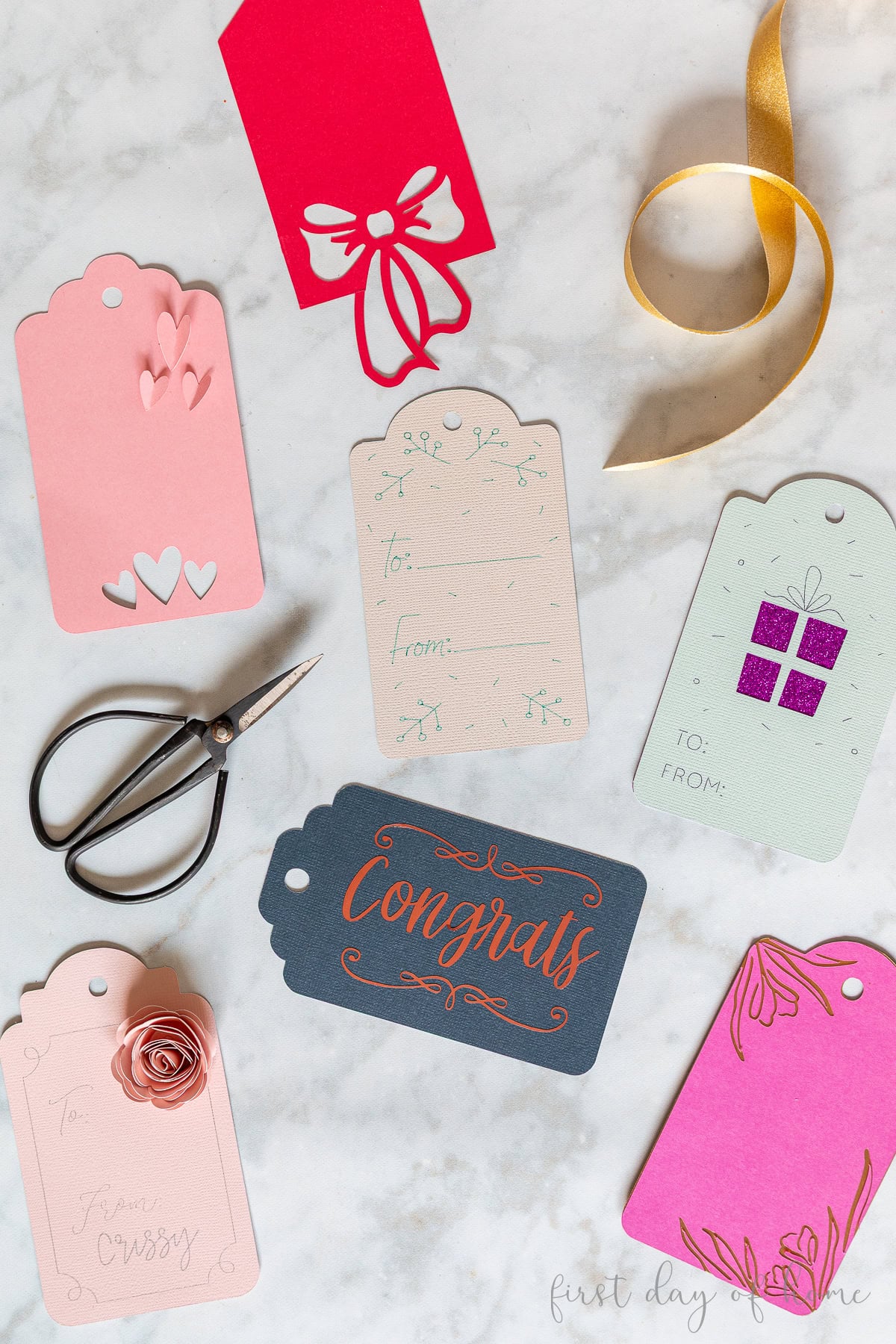 Seven different Cricut gift tags with various designs using foil transfer, pens, vinyl, and simple cutouts.