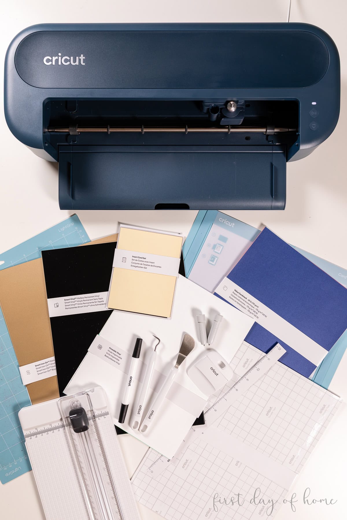Cricut Maker 5 shown with accessories included in the Essential Bundle.